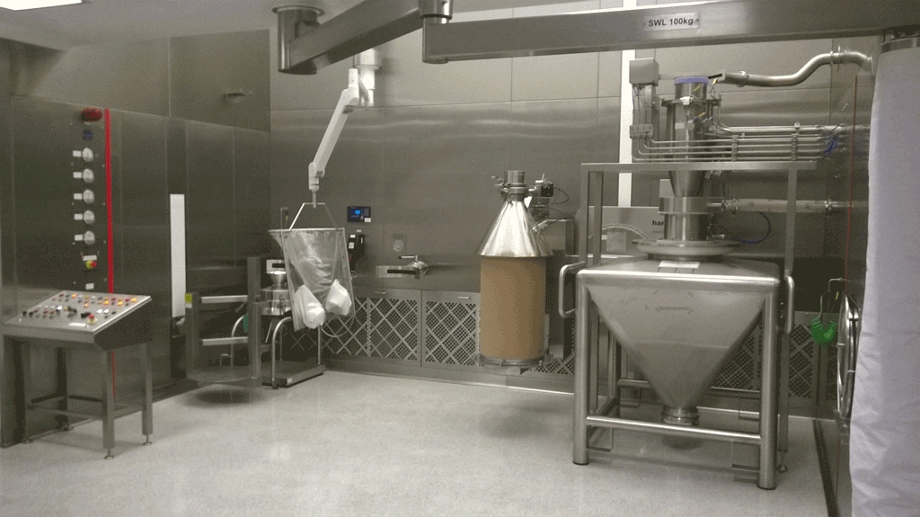 What is a downflow booth in the pharmace